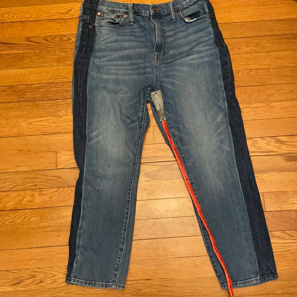 Madewell jeans with dark stripe on the side